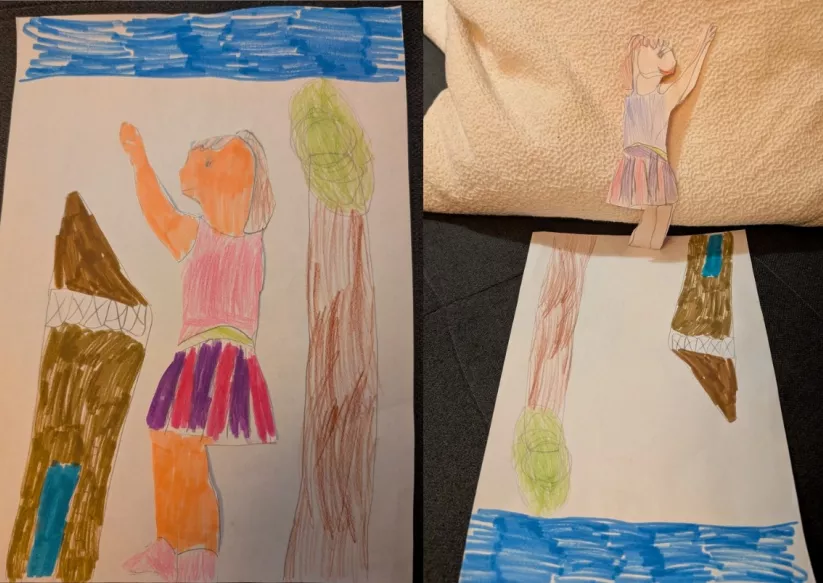 Das Bild zeigt mich (Mara) als ausgeschnittene, beweglich platzierte Figur und soll mich bei der Bewegung und Lebendigkeit auf dem Pausenhof unserer Schule zeigen. 